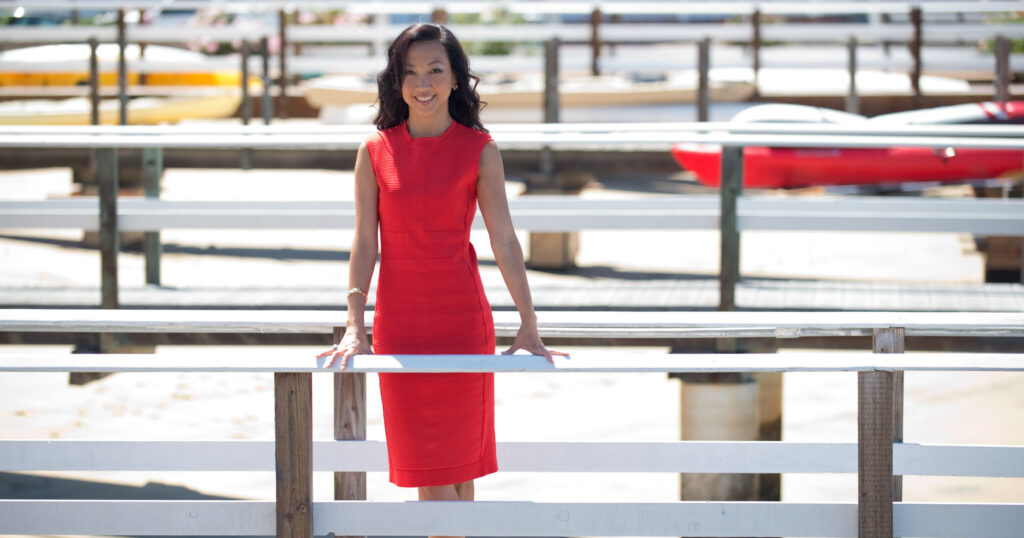 Jennifer Lee standing on a bridge