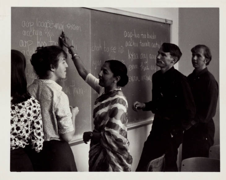 Historical black and white photo of students at the University of California, Berkeley receiving instruction in South Asian languages from a Fulbrighter.
