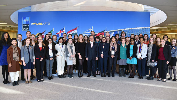 Fulbrighters attend a seminar with Assistant Secretary General for Public Diplomacy, Ambassador Tacan Ildem (center front), at the North Atlantic Treaty Organization (NATO)’s headquarters in Brussels, Belgium in February 2020.