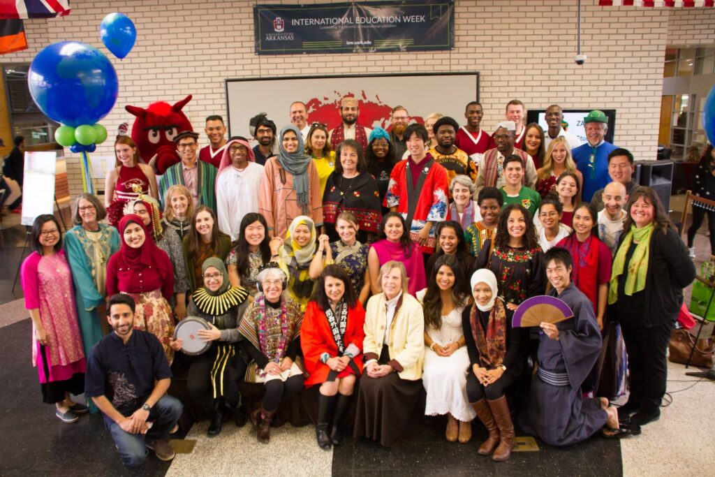 Photo of a large group of Fulbrighters dressed in traditional clothing from different countries.